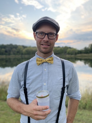 David Lawler outdoors beside a lake